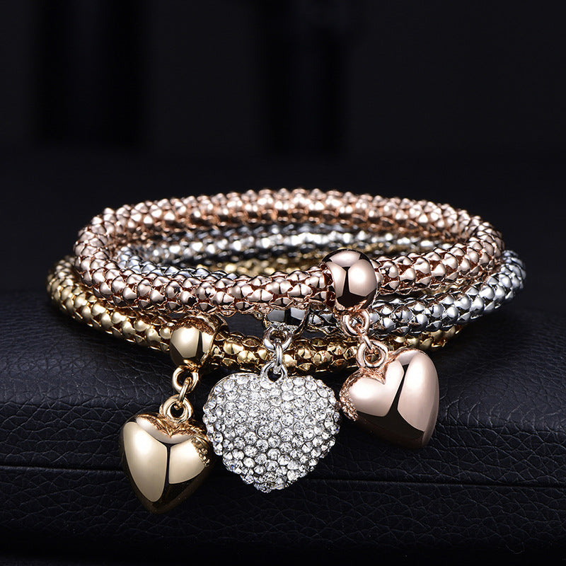 Aria – Bracelet en métal avec cœurs solides