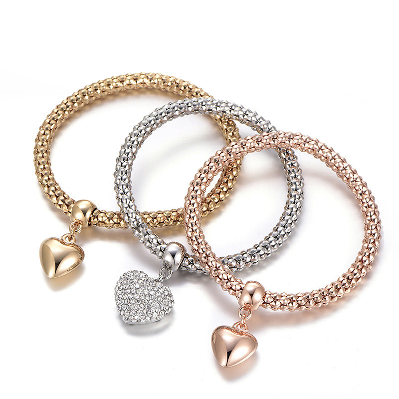 Aria – Bracelet en métal avec cœurs solides
