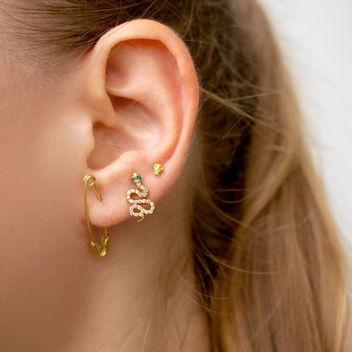 Reem - petites boucles d'oreilles en tête de mort