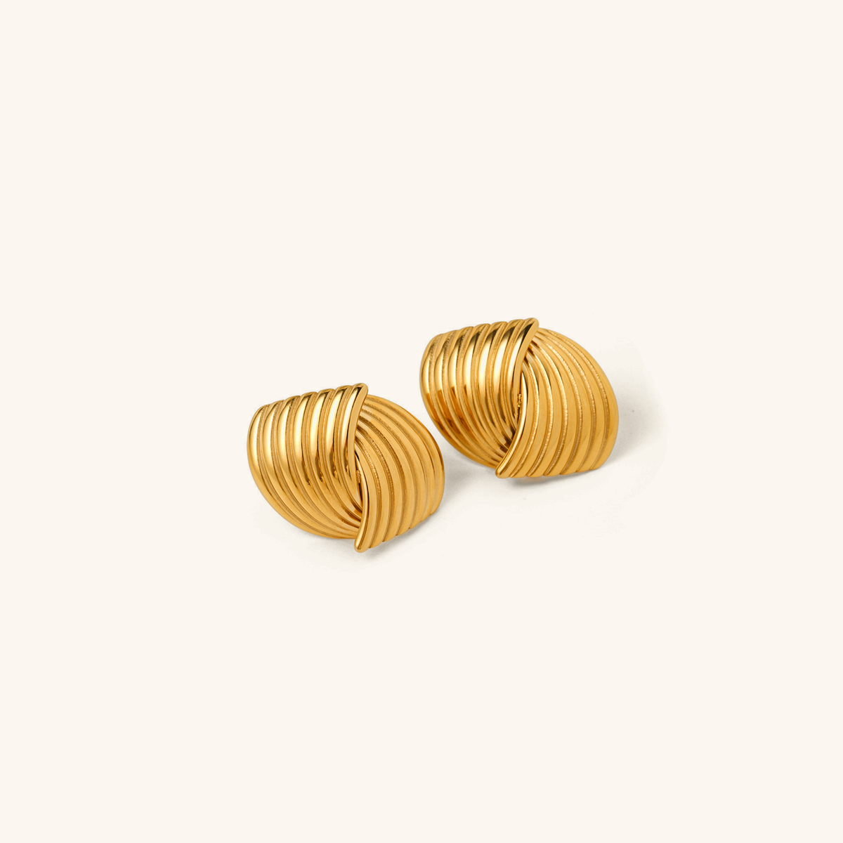 Sonia - Boucles d'oreilles en vagues dorées