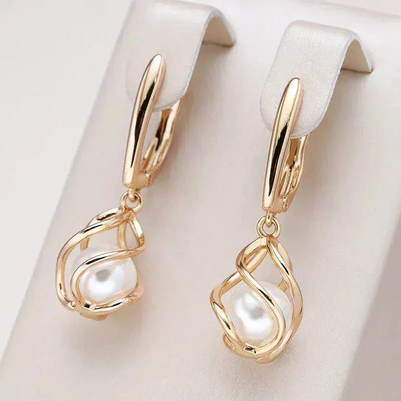 Lyanna – Boucles d'oreilles en perles dorées avec doux éclat