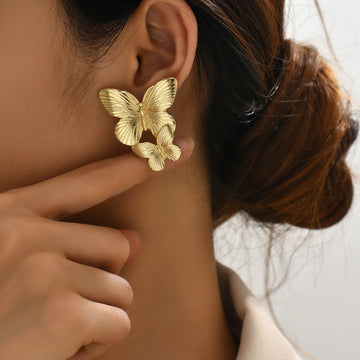 Mariah - Boucles d'oreilles en or en forme de papillon