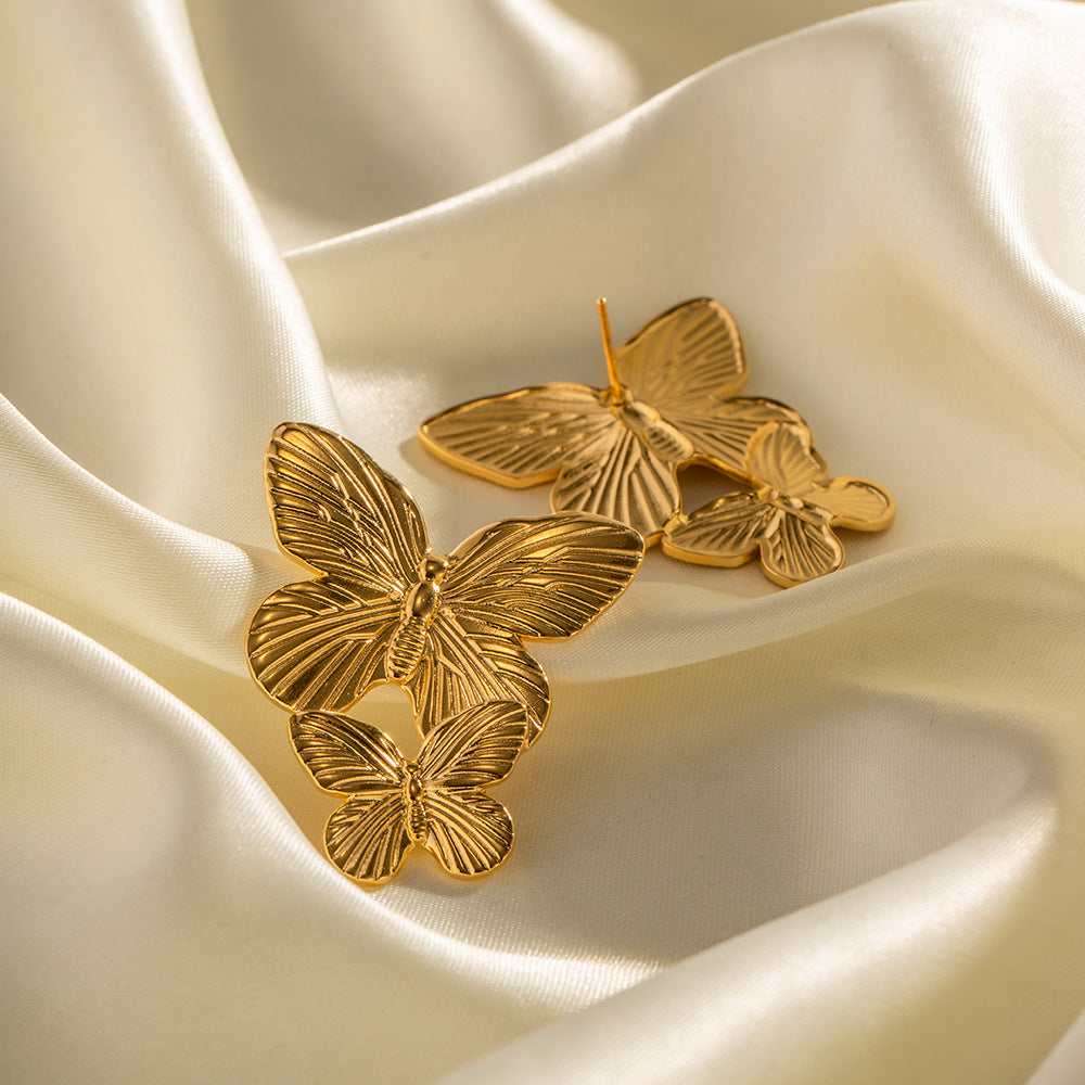 Mariah - Boucles d'oreilles en or en forme de papillon