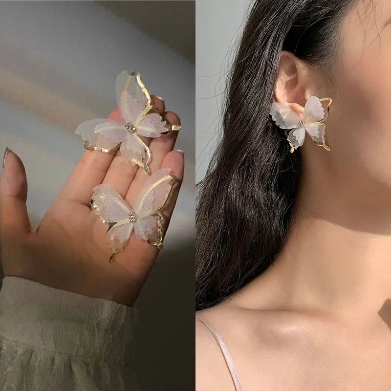 Jean – Boucles d'oreilles papillon en tressage léger