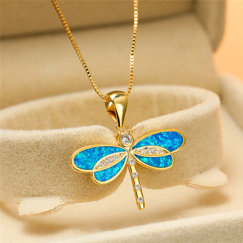 Maggie – Collier libellule dorée avec opale