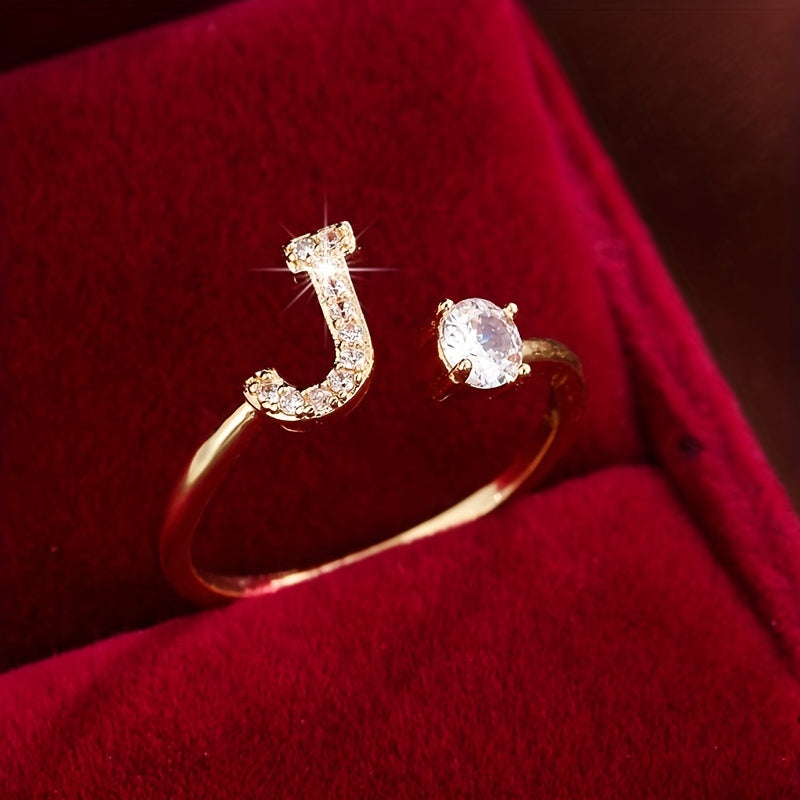 Nova – Bague ouverte moderne avec initiale et zircon
