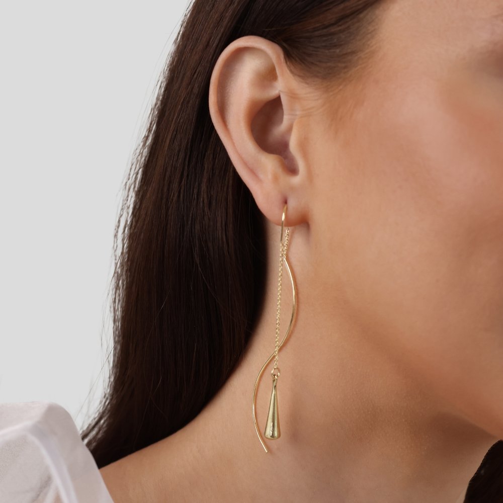 Amaris – Boucles d'oreilles gouttes d'or avec pompons