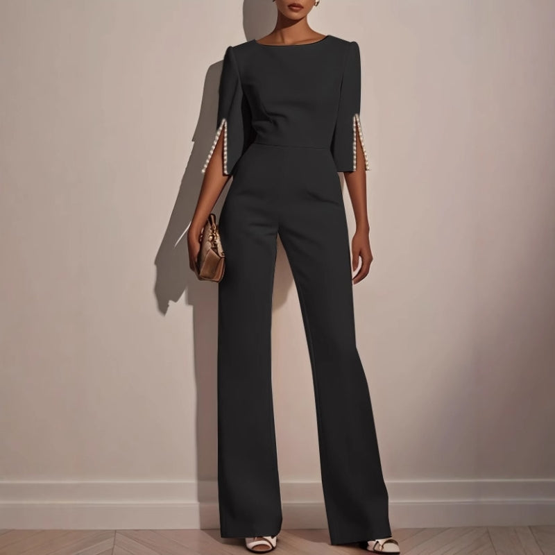 Combinaison femme coupe sculptée détails perles jambes évasées