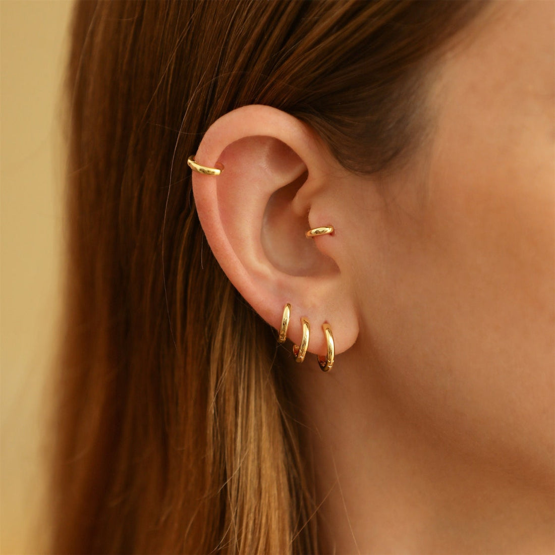 Boucles d'oreilles Huggie en or - 7 pièces d'anneaux