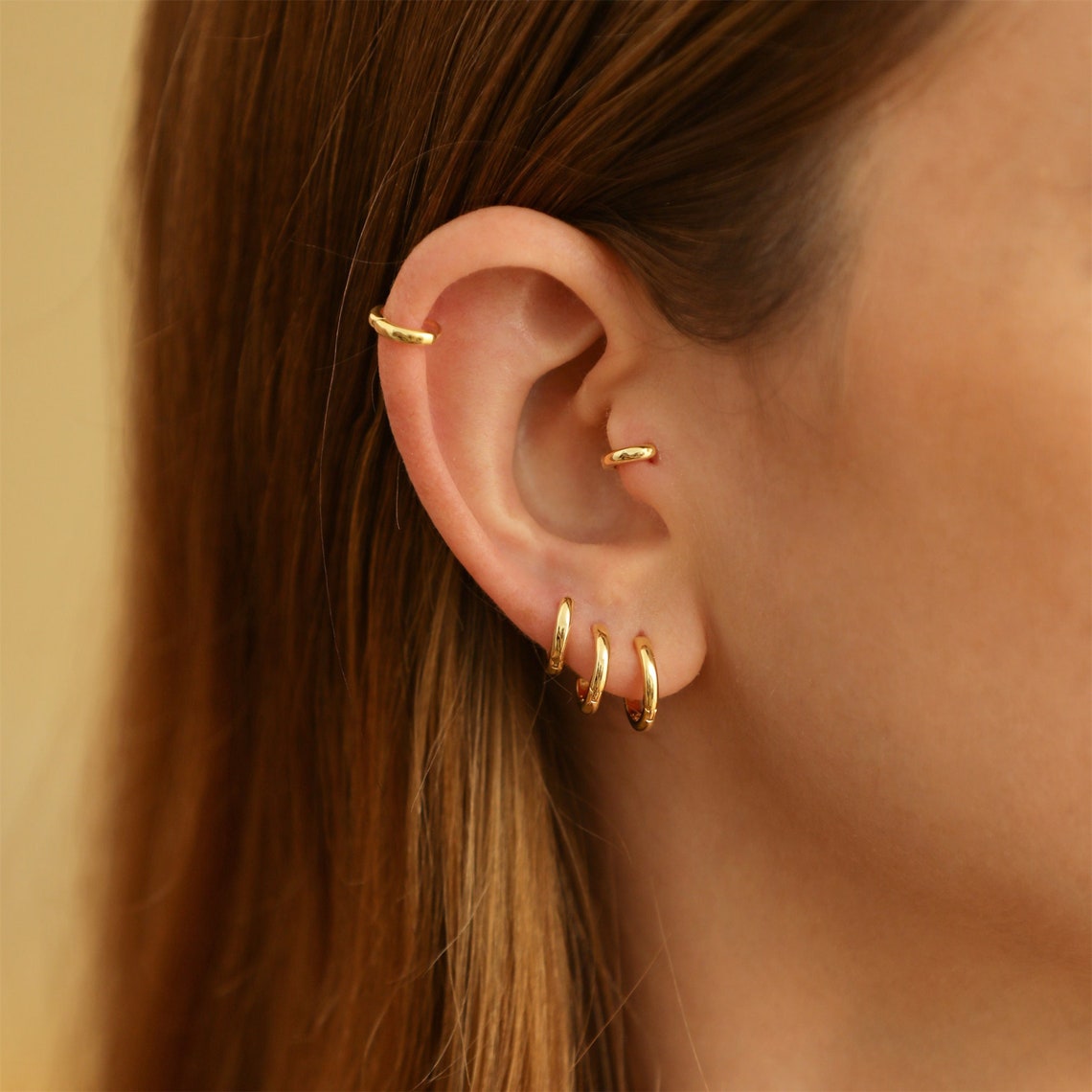 Boucles d'oreilles Huggie en or - 7 pièces d'anneaux