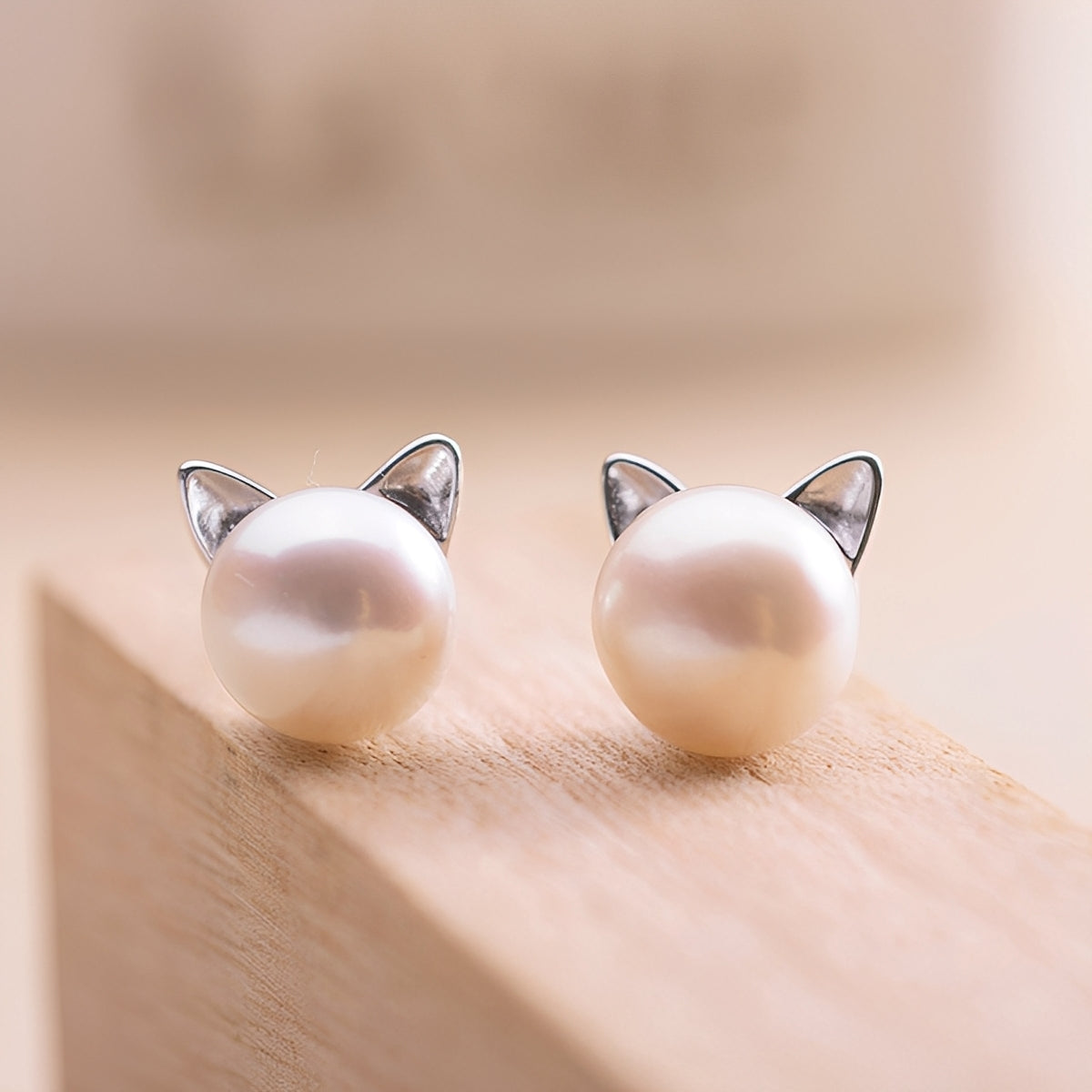 Nori – Boucles d'oreilles en chatons et perles d'argent