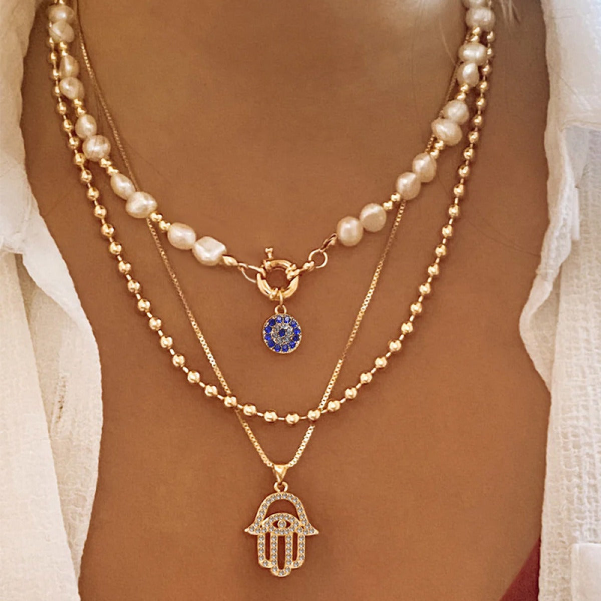Jade – Collier de perles à plusieurs niveaux et Hamsa