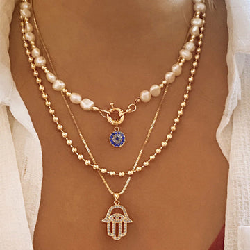 Jade – Collier de perles à plusieurs niveaux et Hamsa