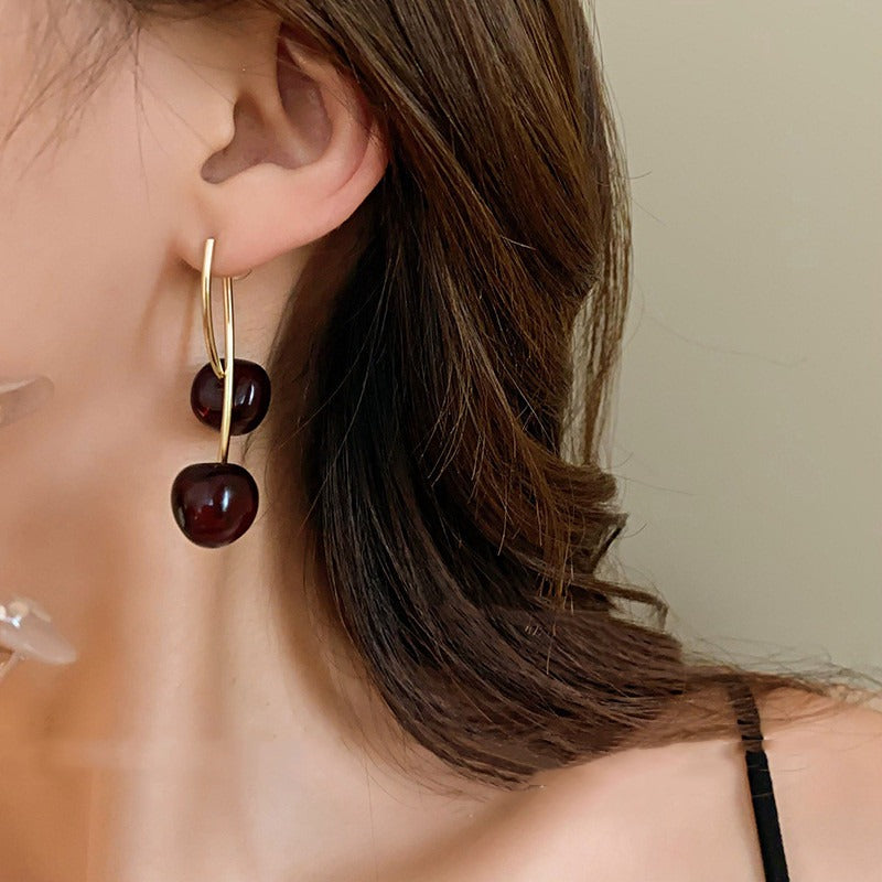 Cheri – Boucles d'oreilles dorées pendantes en cerisier