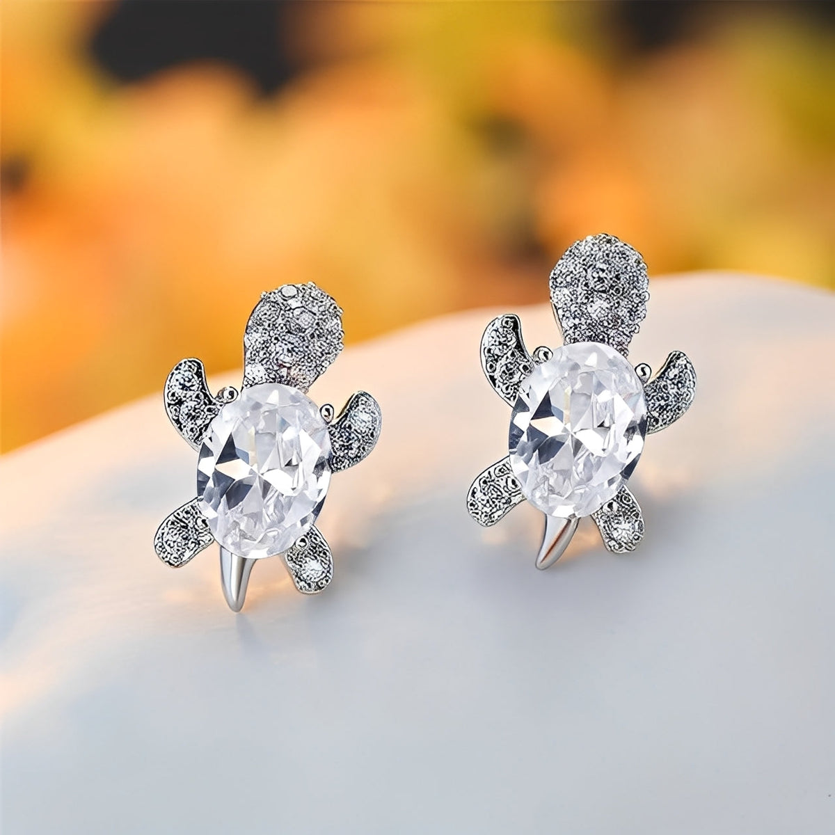 Talia – Boucles d'Oreilles de Tortue Marine en Argent et Zircons