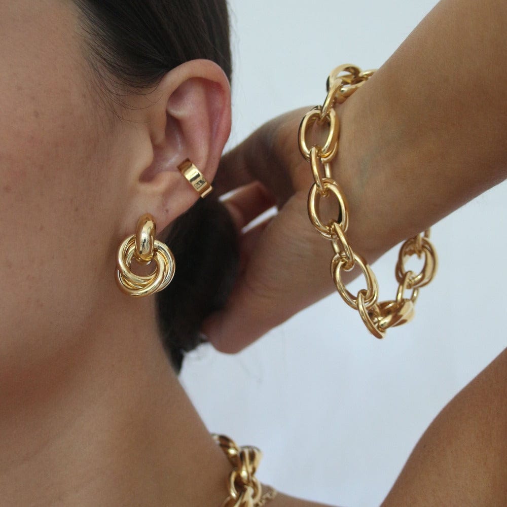 Rania – Boucles d'oreilles design entrelacé en or